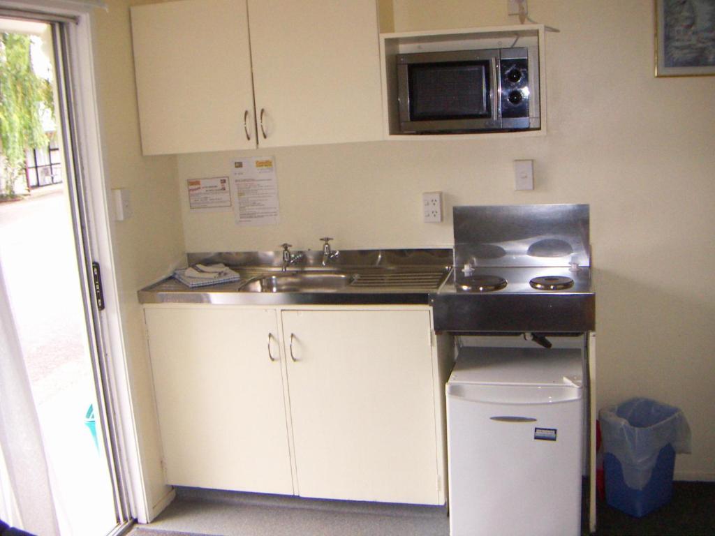 Camellia Court Family Motel Таупо Номер фото